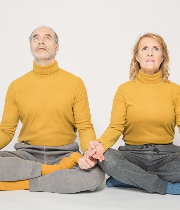 Person smiling peacefully after a gentle exercise session.